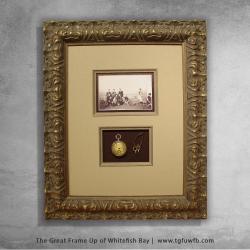 Framed antique pocket watch and photo